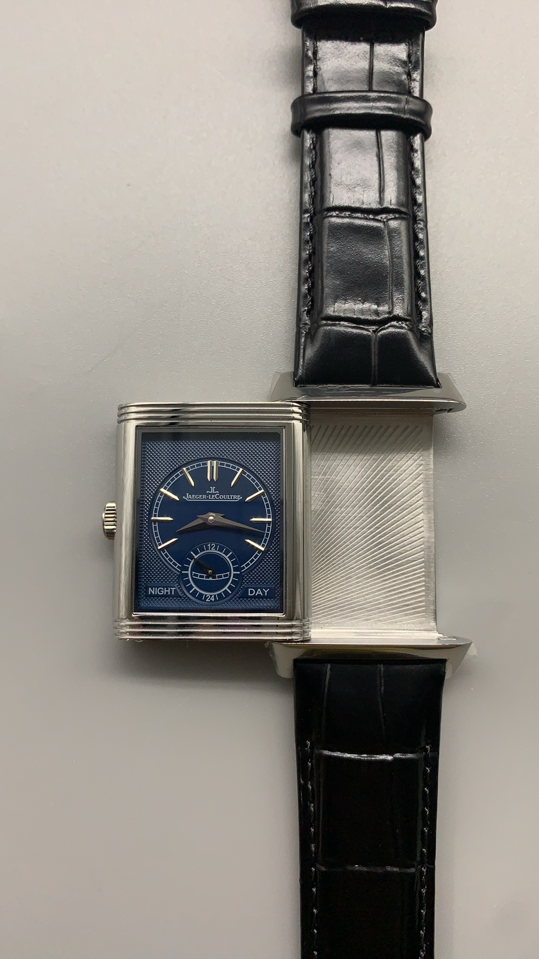 Both faces of the Reverso Tribute Duoface replica shown together, front dial beside the reverse dial