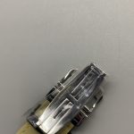 Lug and cradle junction of the replica Reverso Tribute Duoface in polished stainless steel