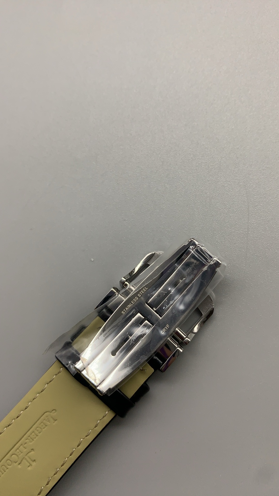 Lug and cradle junction of the replica Reverso Tribute Duoface in polished stainless steel