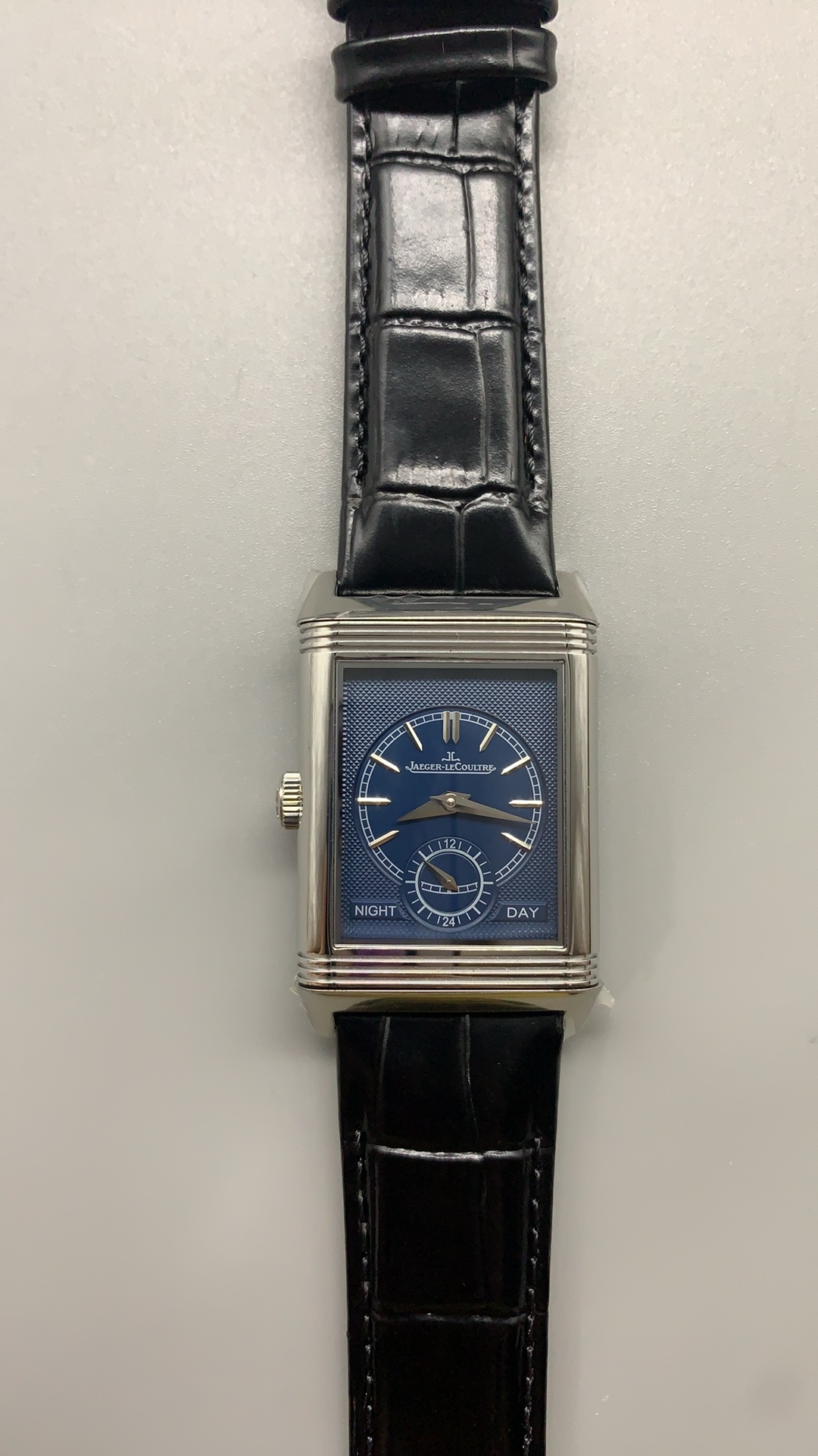 Pin buckle and strap tip of the replica Jaeger-LeCoultre Reverso Tribute Duoface in steel