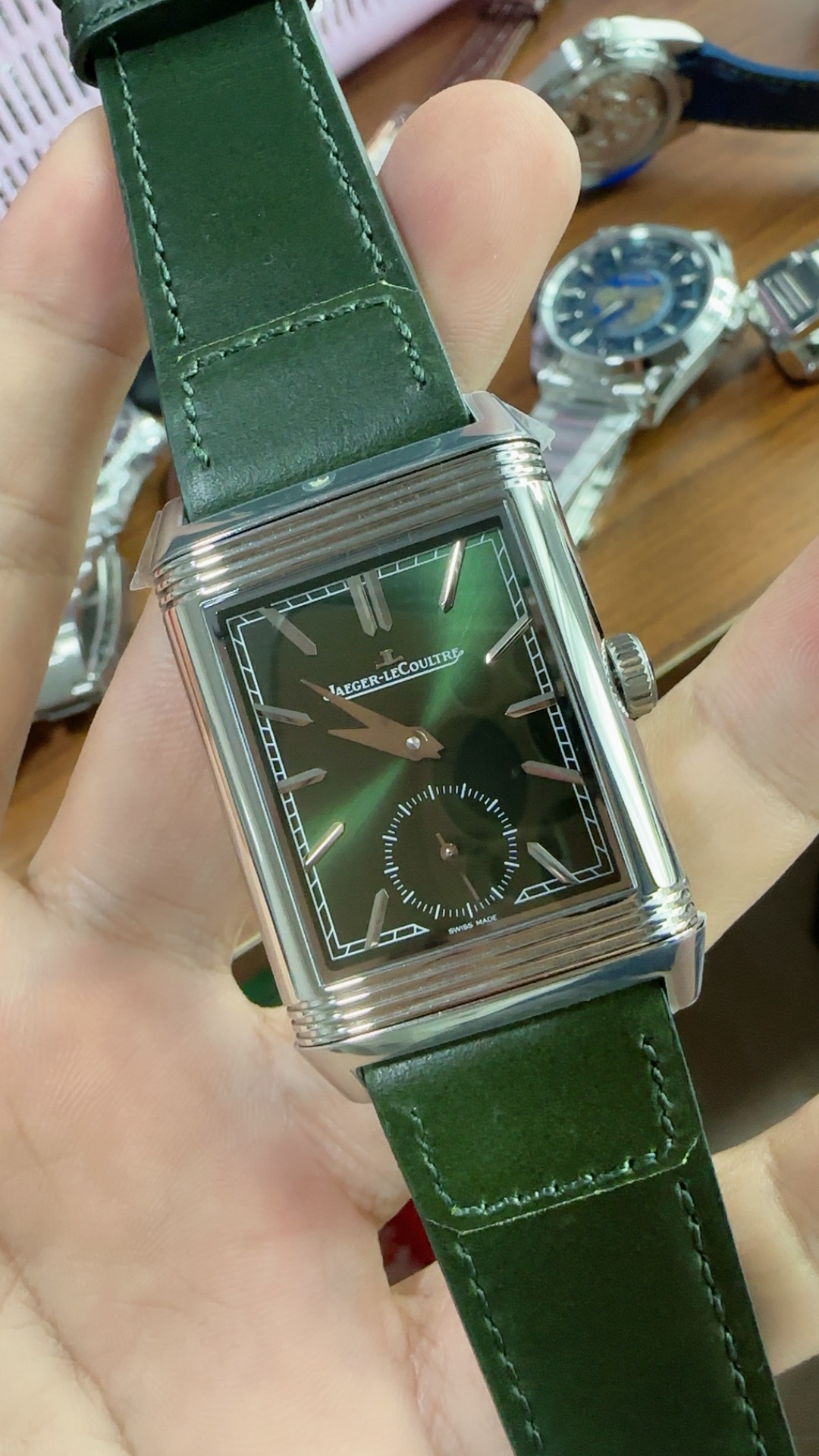 Cradle and lug detail showing how the steel Reverso case pivots inside its rectangular frame