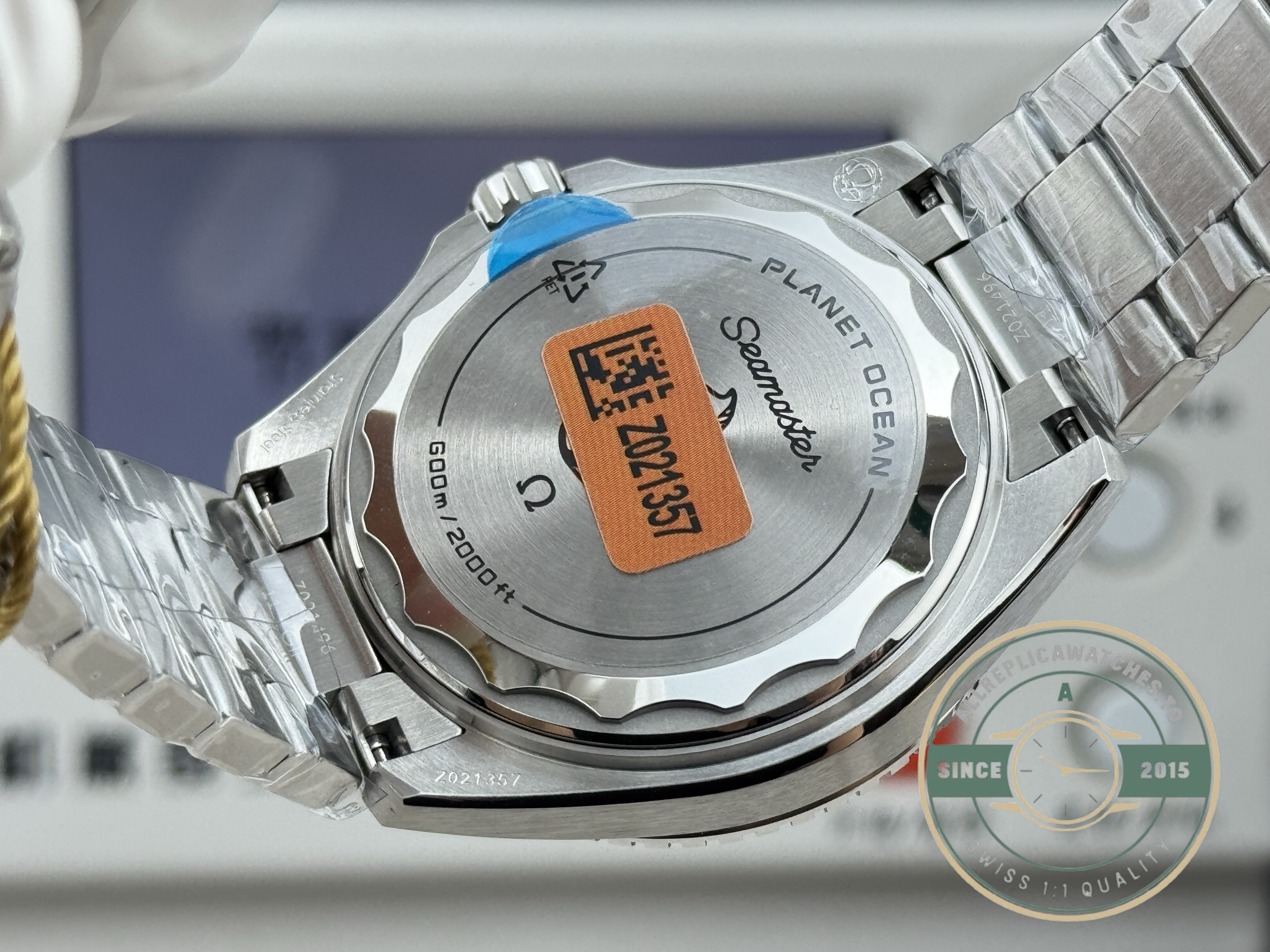 VS8900 clone automatic sitting inside the black-dial 42mm Omega Planet Ocean 600M