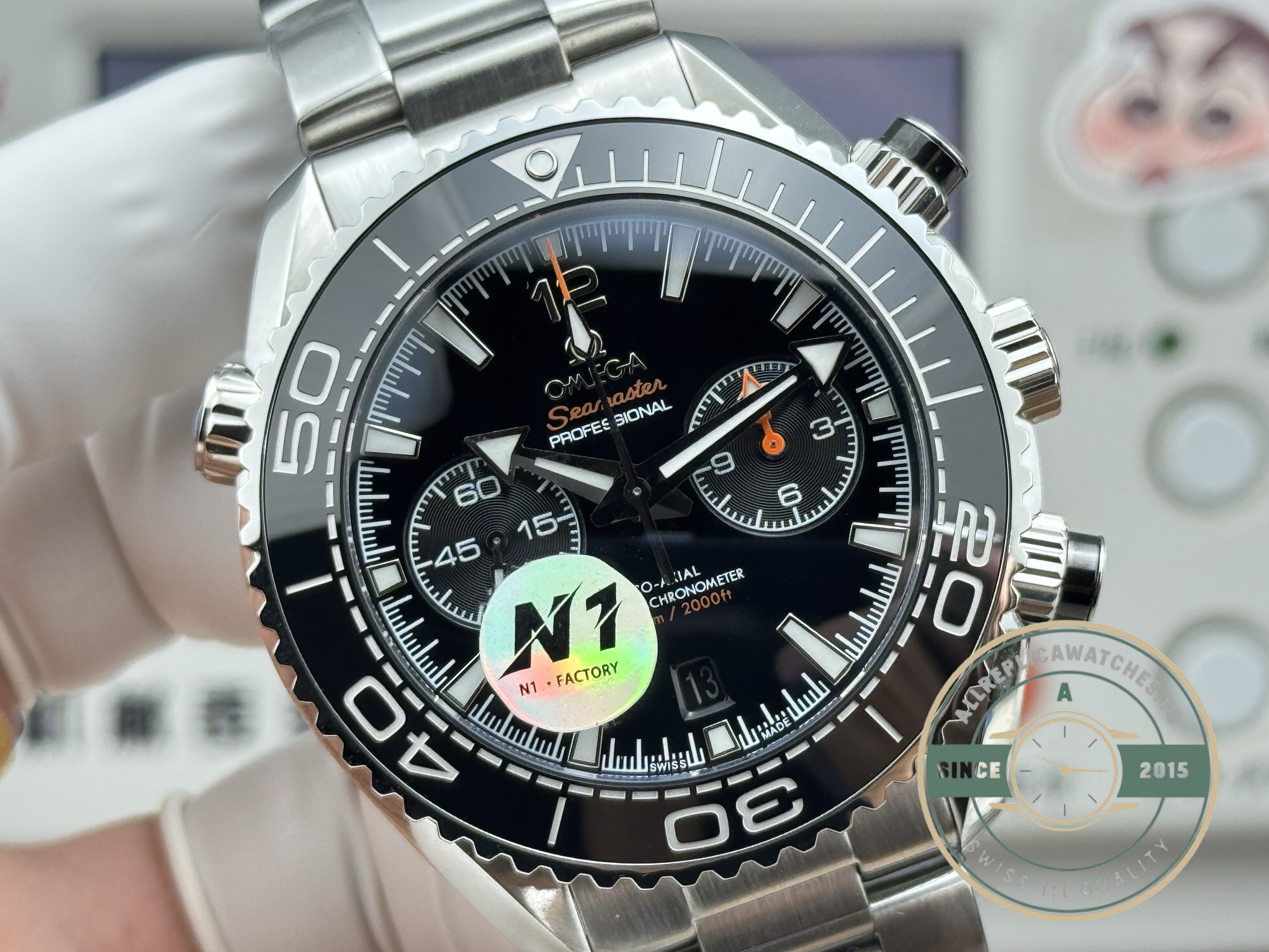 Two chronograph sub-registers at 3 and 9 on the super clone Omega Planet Ocean 600M dial