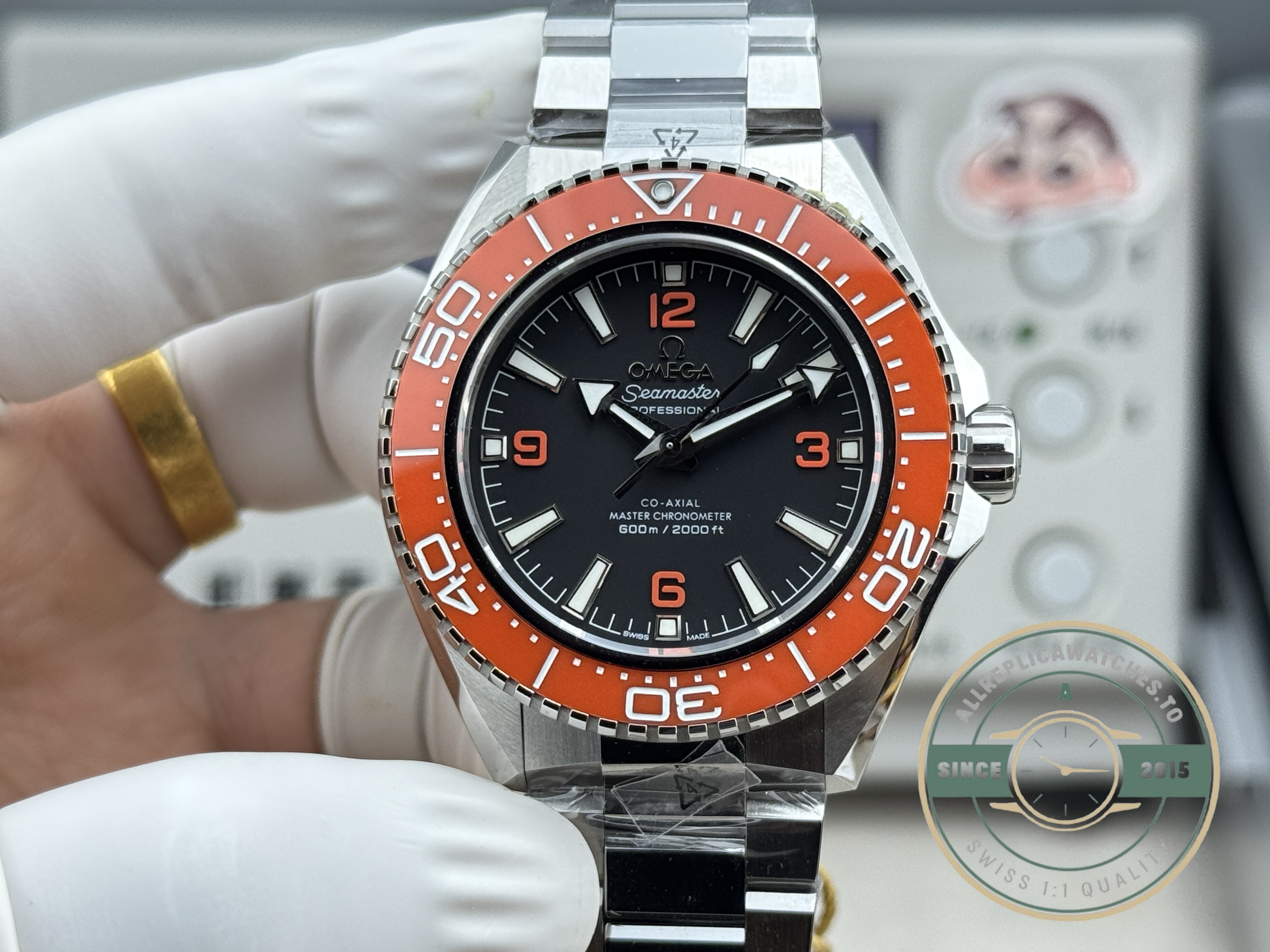 VS8900 clone movement in the orange-bezel Omega Seamaster Planet Ocean 600M