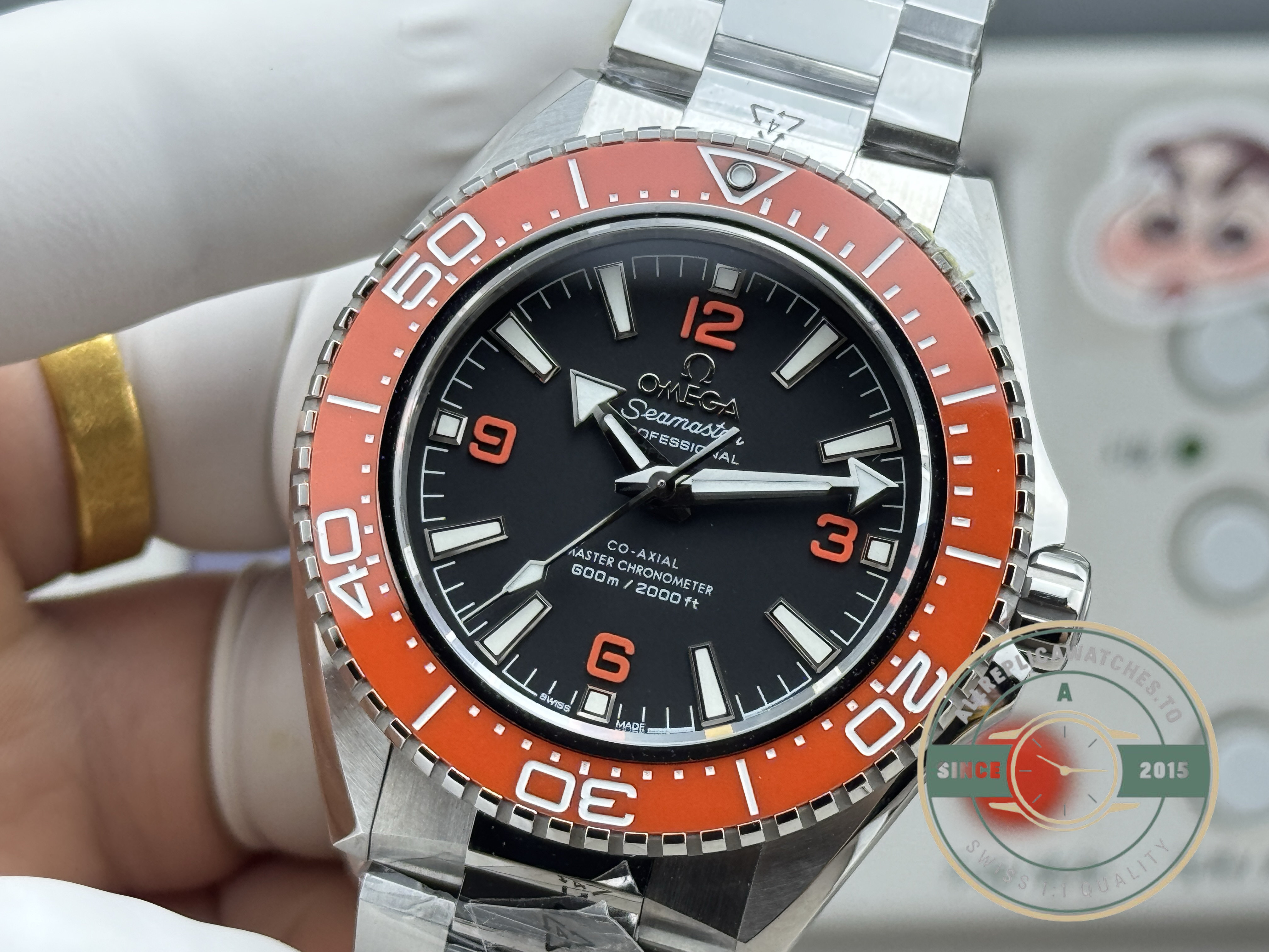 48-hour power reserve behind the orange-bezel Omega Planet Ocean 600M clone