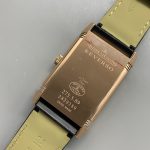 Flat lay of the JLC Reverso Duoface Q3842520 replica with the alligator strap laid open
