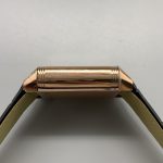 Polished rails against brushed flanks on the rose gold case of the Reverso replica