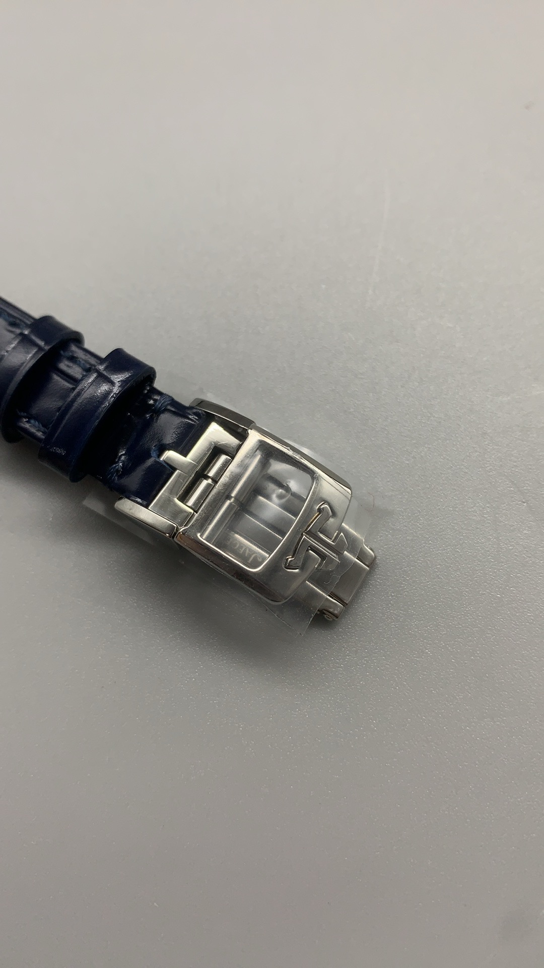 Three-quarter view of the diamond-set Reverso with the blued hands catching the light