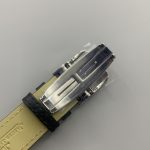 Rectangular 45.6 x 27.4 mm steel Reverso worn on the wrist, dial facing upward