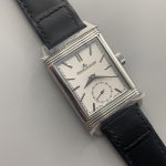 Side profile of the slim steel Reverso case where it meets the smooth leather strap
