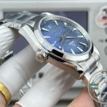 Geneva-wave decorated rotor turning inside the clone Omega Aqua Terra dark navy model