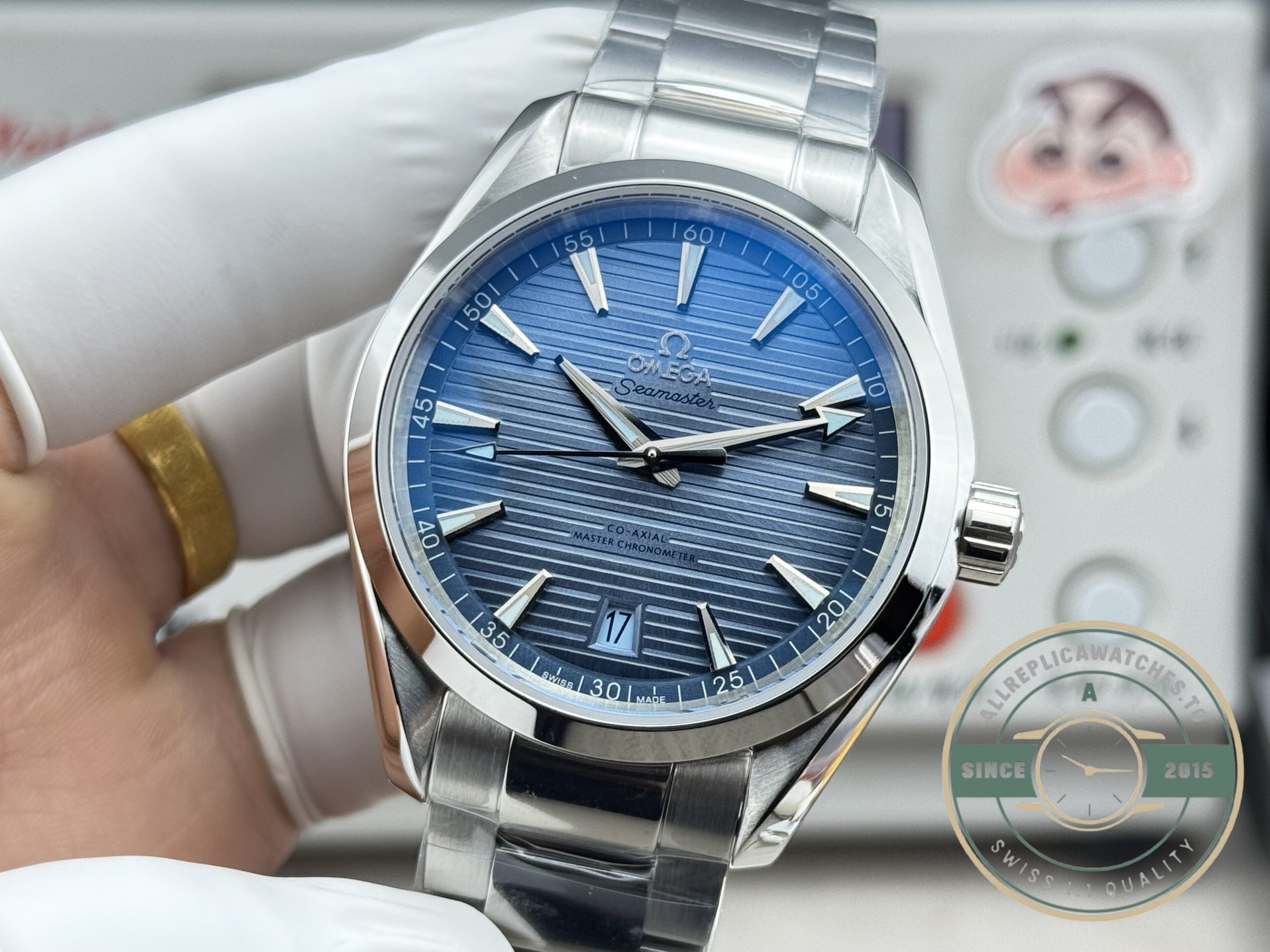 Double-sided anti-reflective sapphire over the super clone Omega Aqua Terra navy dial