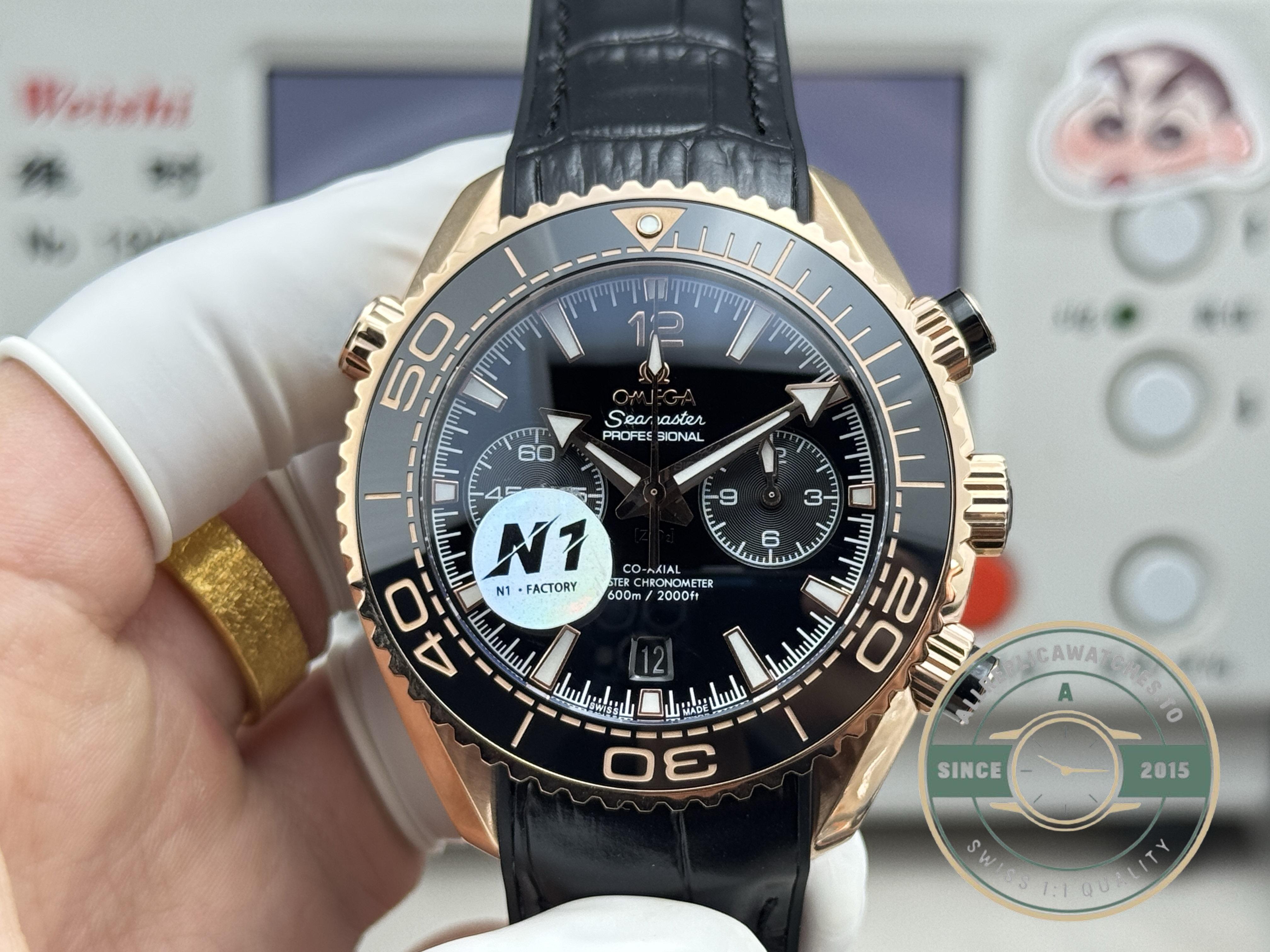 Clone Omega Planet Ocean 600M chronograph, its black dial carrying the elapsed-time subdials