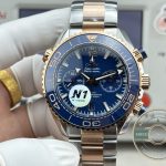 Unidirectional ceramic bezel with gold-toned diving scale on this Planet Ocean clone