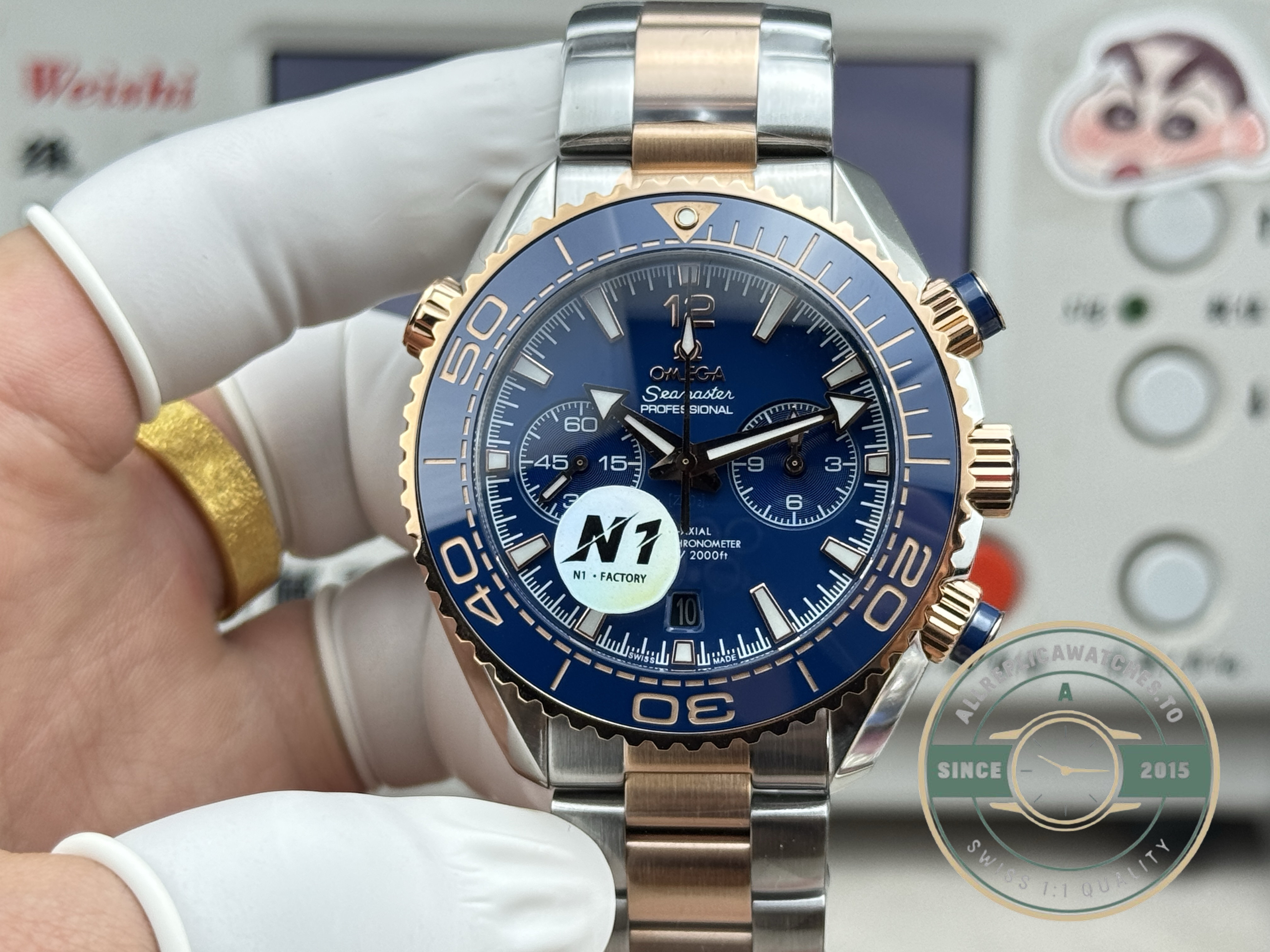 Unidirectional ceramic bezel with gold-toned diving scale on this Planet Ocean clone