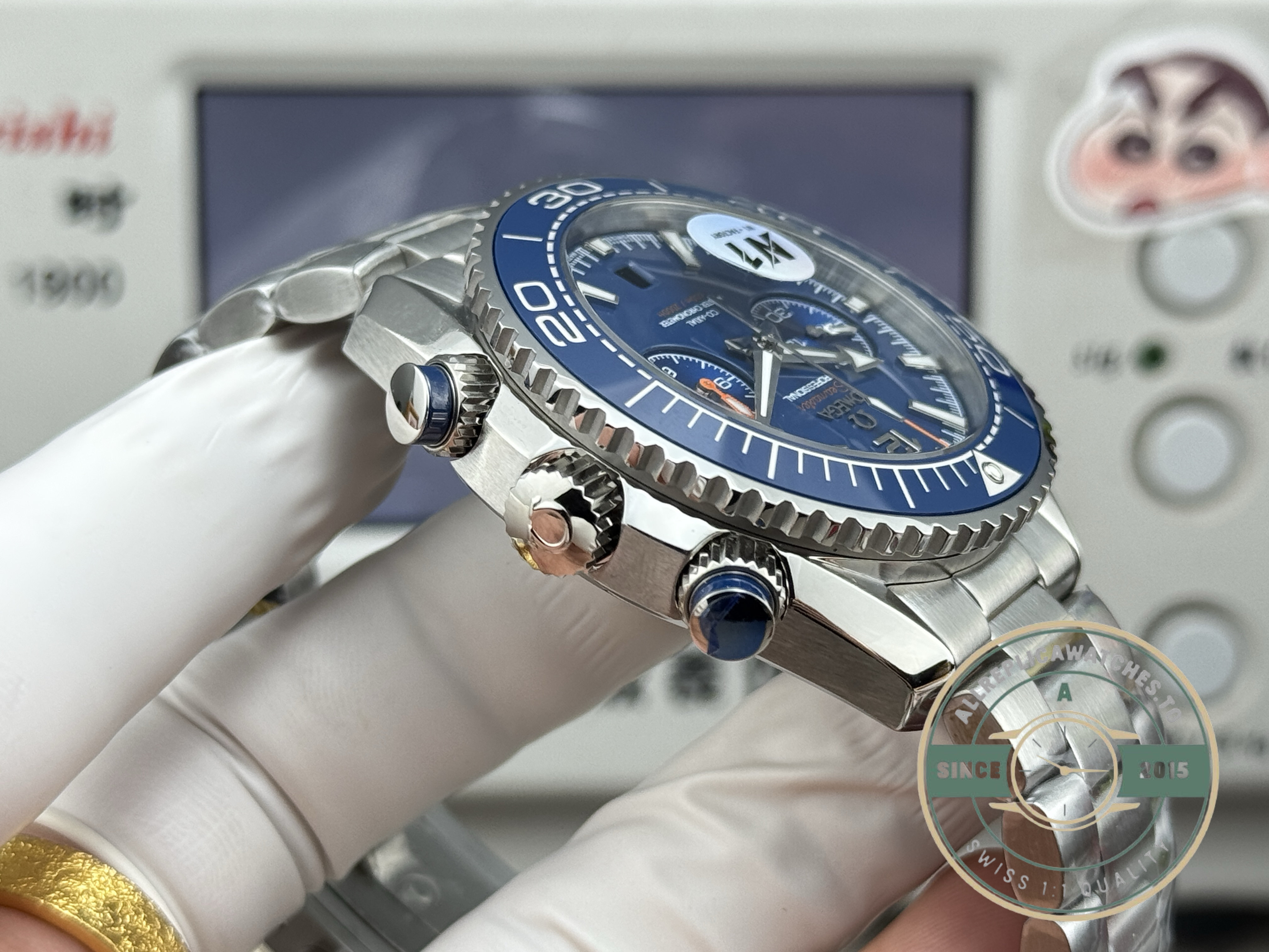 Unidirectional ceramic bezel with a liquidmetal minute scale on the Planet Ocean superclone