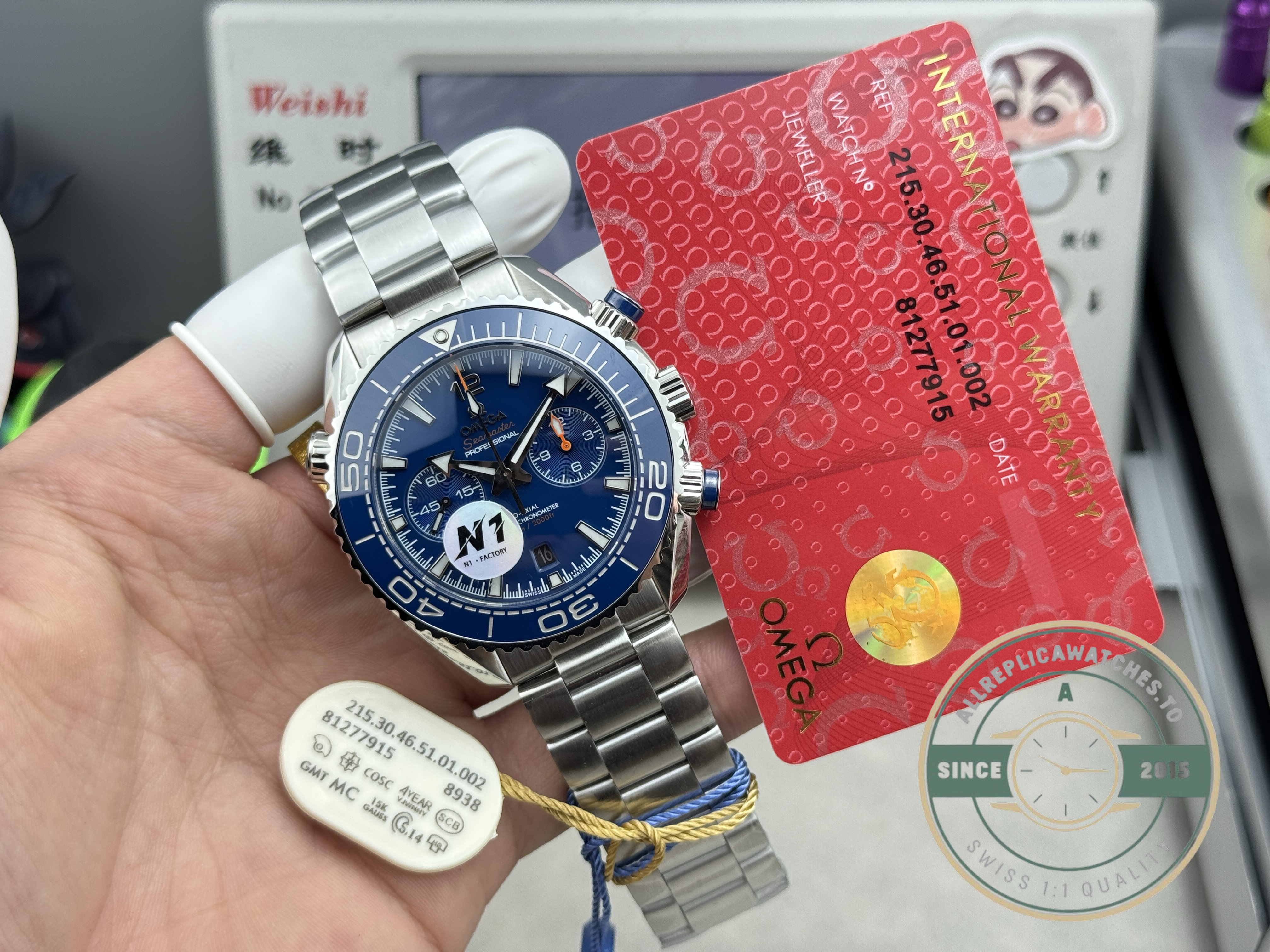 Date window sitting beside the chronograph counters on this superclone Omega Planet Ocean dial